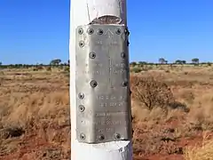 The original border post and plaque on the border of the Northern Territory and Western Australia