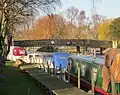 Beccles: upstream view of Bridge St bridge, showing height limit