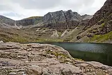 The triple buttresses of Coire Mhic Fearchair behind Beinn Eighe.