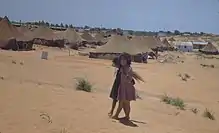 An old picture from 1950 showing Yemenite Jews in Ma'abarot, a series of refugee camps in Israel.