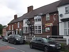 Belbroughton Workmen's Club and High Street in 2010