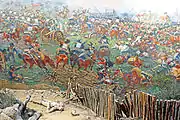 Painting detail: the Duke of Wellington and his staff (top right) sheltering from French cuirassiers in a square of Highland infantry.