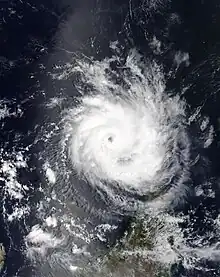 Satellite image of Belna showing a ragged eye and well-defined rainbands