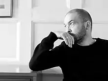 Ben Watt gazes to the left