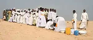 Baptism ceremony of the Celestial Church of Christ in Cotonou, Benin.