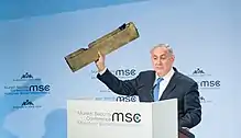 Netanyahu displays piece of armed Iranian drone