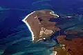 Image 21Aerial view of the low-lying island of Berneray in the Outer Hebrides, known for its sandy beaches backed by machairCredit: Doc Searls