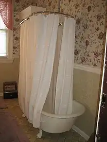 Bathtub with curtain at the Bernheimer House