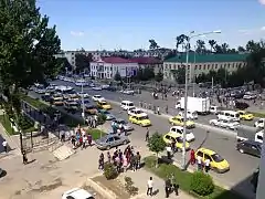 Many yellow taxis on the streets of Samarqand