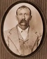 Bill Donning imprisoned in 1901.