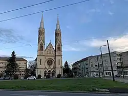 Nicolae Bălcescu Square with its Roman Catholic church in Elisabetin