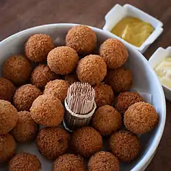 Bitterballen are small snacks similar to the larger kroketten and are usually served with mustard.