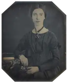 Photograph of Emily Dickinson, seated, at the age of 16