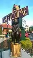 Carved wooden bear sign at a Black Bear Diner