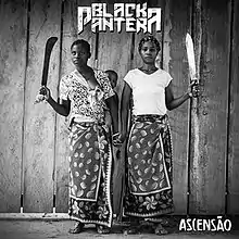 two women holding machetes and holding hands