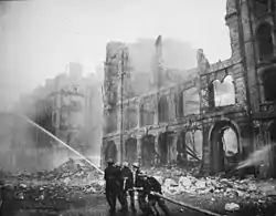 Image 23Firefighters putting out flames after an air raid during The Blitz, 1941 (from History of London)