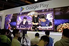 Blitzchung, a pro-democracy player representing Hong Kong, in a tournament against another player, at the Google Play Booth B211, World Trade Center One.