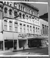 Lion Store entrance with statue lions at right, 1935