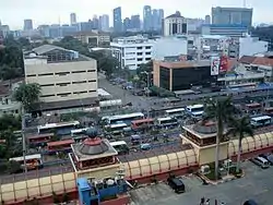 Blok M shopping center and terminal, with the Sudirman Central Business District in the background, are located in the District of Kebayoran Baru, South Jakarta.