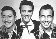 Scotty Moore, Elvis Presley, Bill Black (from left to right)