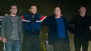 Blur at Wembley Stadium in 2023. From left to right: Graham Coxon, Damon Albarn, Dave Rowntree  and Alex James