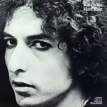 A black-and-white close-up of Dylan's face