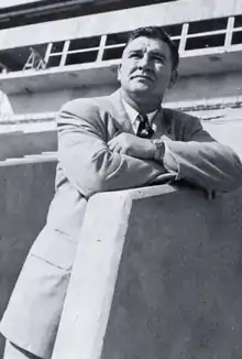 Bob Woodruff, white man in his early to mid-30s, shown in a suit jacket and tie