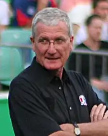 Headshot of Bob Willis in a black polo shirt.