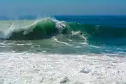 Body surfing large waves at the Wedge