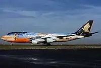 9V-SPL in "Rainbow" livery