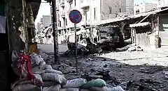 Bombed out vehicles in Aleppo