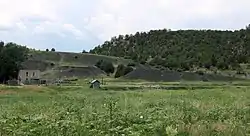 An old house and a slag heap in Boncarbo