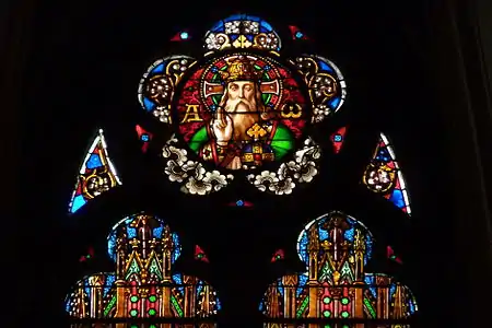 Top of central window in the axis chapel - "Alpha and Omega"