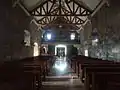 Main door and choir loft, looking down the nave