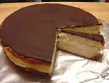 Boston cream pie is a cake that is filled with a custard or cream filling and frosted with chocolate.