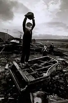 Image 4Boy destroying piano at Pant-y-Waen, South Wales, by Philip Jones Griffiths, 1961 (from Photojournalism)