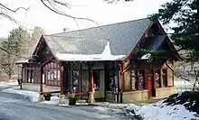 One-story red Tudor building