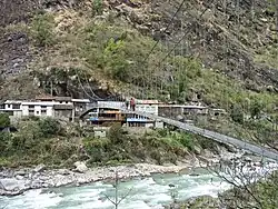 Bridge crossing with Taghring in the background