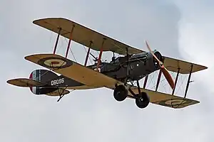 Colour photo of biplane in flight