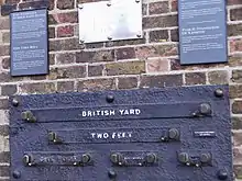 Image 78Yard, foot and inch measurements at the Royal Observatory, London. The British public commonly measure distance in miles and yards, height in feet and inches, weight in stone and pounds, speed in miles per hour. (from Culture of the United Kingdom)