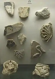 Fragments of painted or carved plaster from interiors