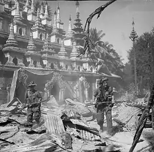 Image 8British soldiers on patrol in the ruins of the Burmese town of Bahe during the advance on Mandalay, January 1945. (from History of Myanmar)