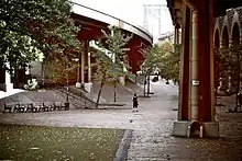 The Brooklyn Banks, a skate park composed of brick obstacles under a series of steel viaducts