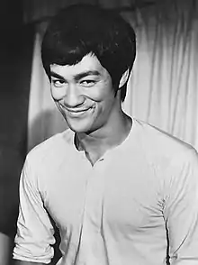 Image 23Bruce Lee popularized the concept of mixed martial arts via his hybrid system of Jeet Kune Do during the late 1960s to early 1970s. (from Mixed martial arts)