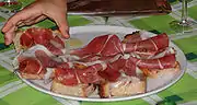 Bruschetta with olive oil and prosciutto