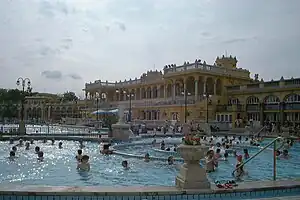 Pool in front of a large building