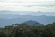 As seen from Mount Budawang, (Pigeon House on right horizon)