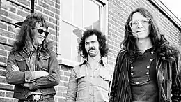 Budgie in 1974; Left to right: Pete Boot, Tony Bourge, Burke Shelley.