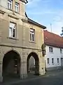 Former community centre (Bürgerhaus) with statue