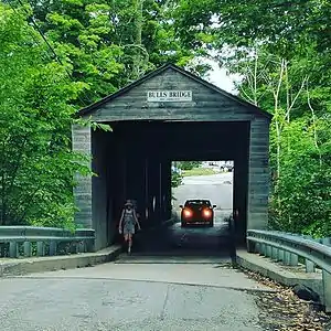 color photo of covered bridge